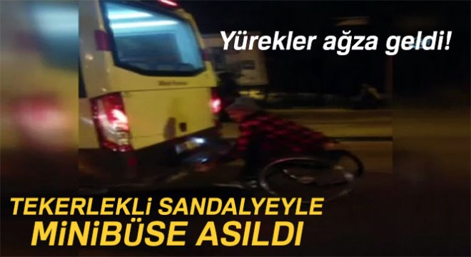 Tekerlekli sandalyeyle minibüse asıldı